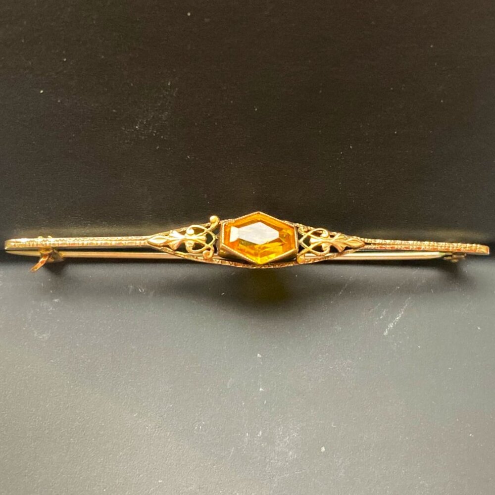Antique citrine bar brooch set in detailed 10K gold